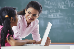 Teacher with young student