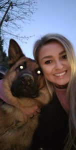 Student with dog.