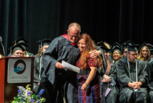 President Roache and Graduate