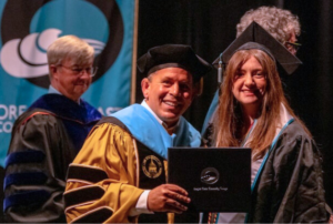 President Roache and Graduate