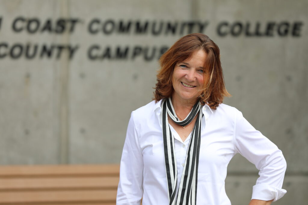 Katja Mueller standing in front of campus